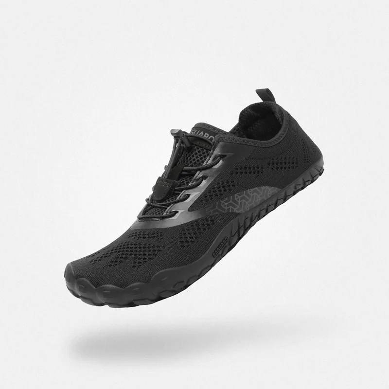 Zapatilla barefoot Saguaro Smart I en color negro, vista lateral